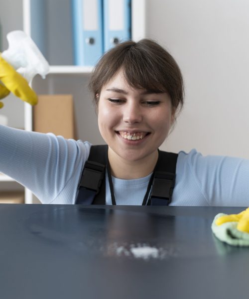 person-taking-care-office-cleaning
